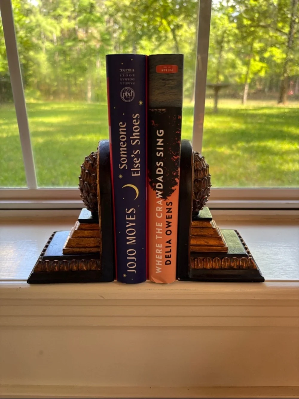 Set Of Bookends Featuring Pineapple Finial Design Atop A Tiered Base.